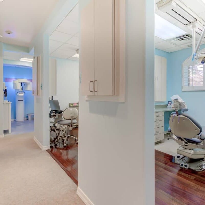 Welcome dental treatment room with dental chair and tools